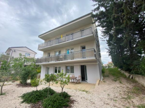 Apartments with a parking space Krk - 22454